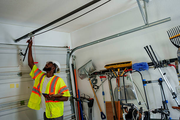 Professional Garage Door Panel Replacement technician working in Delaware County County, NY